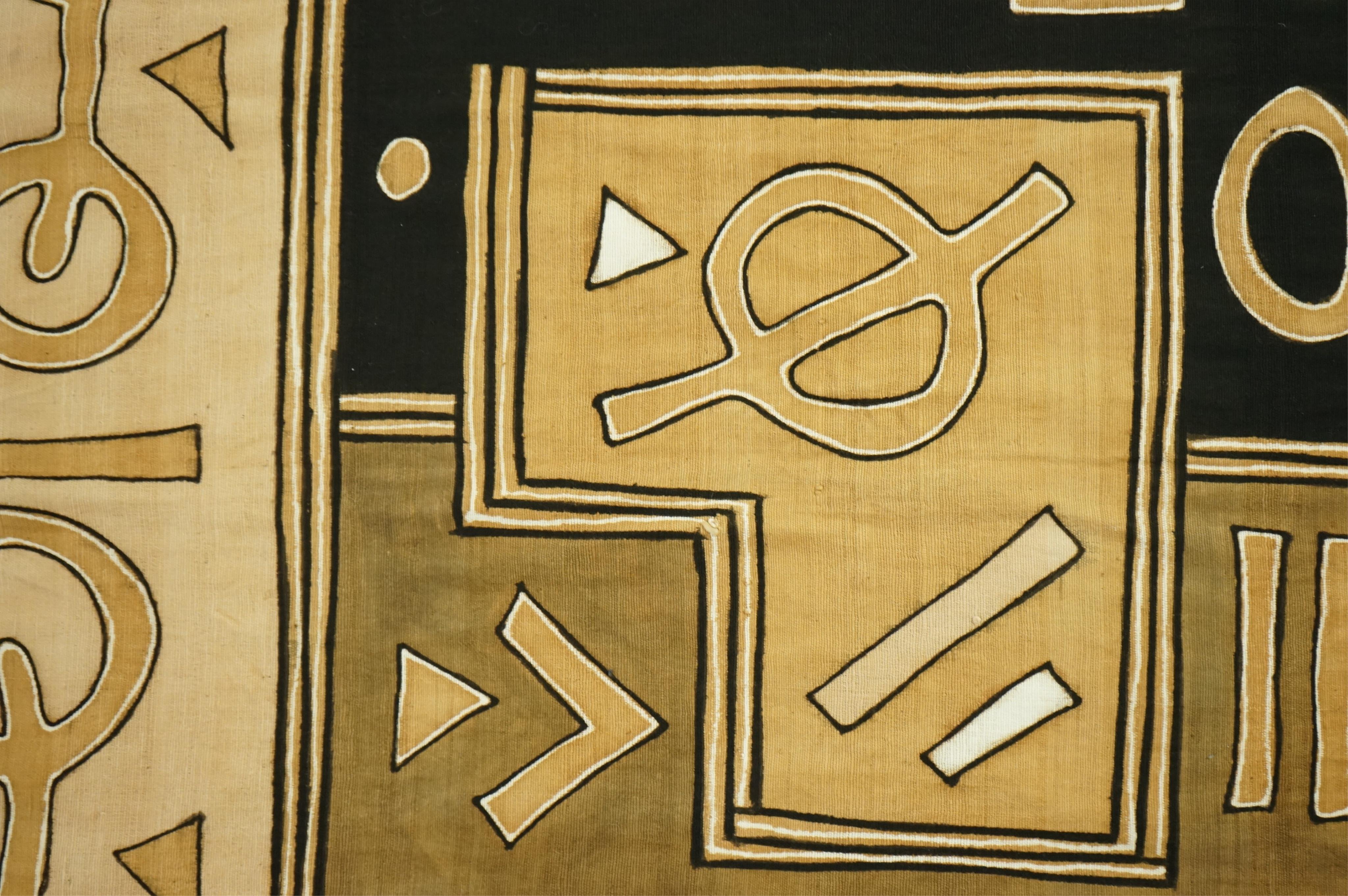 A collection of five 20th century African Congo hand woven and embroidered raffia palm leaf runners and mats, together with a later large printed hanging. 260cm x 138cm. Condition - one smaller mat has a hole in the weav